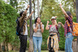 © Sirirat Makprasert - Group Asian people with backpack summer outdoor and happy are taking photo at forest in the evening; Attractive young trusted spend time together; Relax time on holiday concept travel
