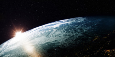 Wall Mural - a view of the earth from outer space/3d rendering rotating planet earth with a sun-baked side and a 