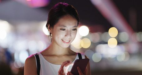 Canvas Print - Woman use of mobile phone in outdoor cafe