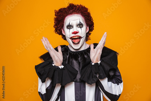 Fotografía Funny clown looking camera with happiness isolated