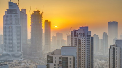 Foggy morning sunrise in downtown of Dubai timelapse.