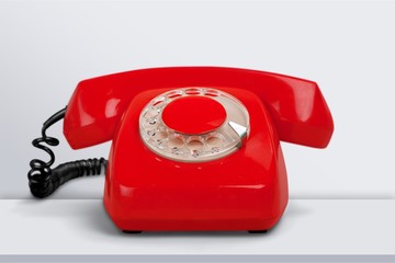 Poster - Retro red telephone on background