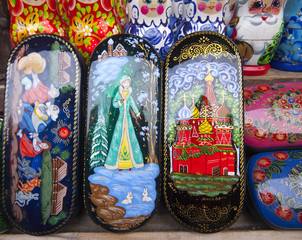 Wall Mural - Palekh caskets with miniature painting (paint papier-mâché boxes) at the flea market Izmailovo. Moscow, Russia. March, 2007