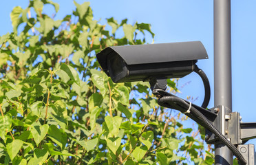 outdoor video surveillance cameras (cctv) watching what is happening on the perimeter of a private area