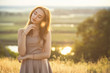 © fantom_rd - portrait of a dreamy girl in a field at sunset, a young woman enjoying nature
