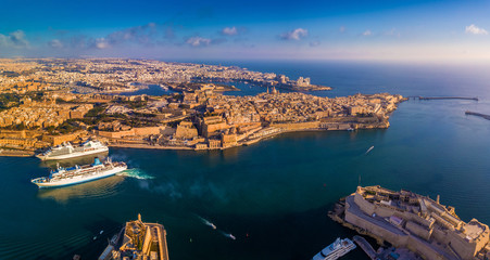 Wall Mural - Valletta, Malta - Aerial panoramic skyline view of the Grand Harbour of Malta with cruise ships. This view includes Valletta, Floriana, Sliema, Manoel Island, Gzira, Birgu and Senglea from above