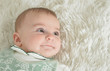 © aletia2011 - Portrait of cute baby girl on white blanket