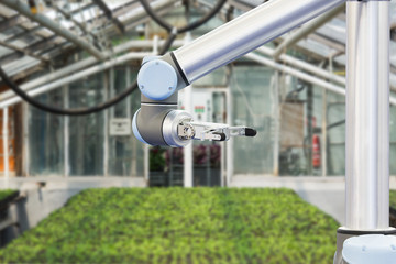 Sticker - the robot arm is working in a greenhouse. smart farming and digital agriculture