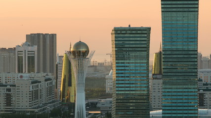 Elevated morning view over the city center and central business district with bayterek Timelapse, Kazakhstan, Astana