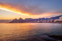 Rio De Janeiro Skyline And Two Brothers (Dois Irmaos) Mountain At Sunset - Rio De Janeiro, Brazil