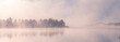 canvas print picture - Beautiful foggy morning. Fog over autumn lake at sunrise moment. Wide panorama.