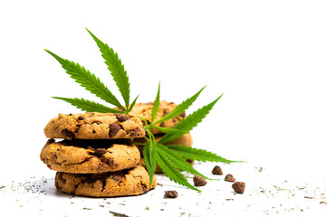 Wall Mural - Chocolate chip cookies with marijuana isolated on white