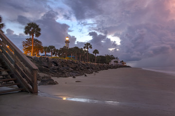 Wall Mural - View Toward Lighthouse from the Pier at Sunrise on St Simons Island, GA