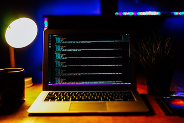 Programmer working in a software development and coding technologies.