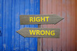 © jaykoppelman - Right and wrong arrows decisions concept