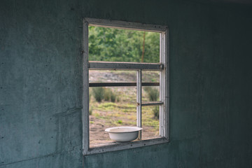 A window in an old abandoned house