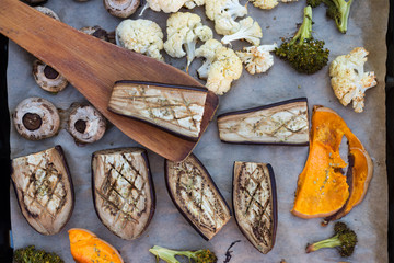 Vegetables grilled, baked, roasted on parchment paper with spices and herbs. Vegan, vegetarian lunch