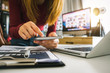 © Nuttapong punna - businesswoman hand using smart phone,tablet payments and holding credit card online shopping,omni channel,digital tablet docking keyboard computer at office in sun light