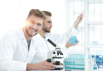 Wall Mural - male researcher carrying out scientific research in a lab