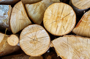 firewood of different shapes folded, close-up background