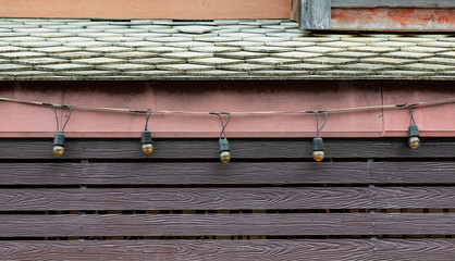 Wall Mural - Roof with lamp decorative on wooden wall