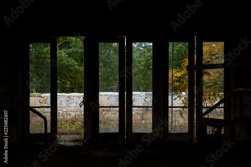 Fotografie, Obraz Doors Out Into Autumn Woods - Abandoned Unity House Resort - Pocono Mountains, P