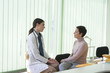 © LStockStudio - A Woman Physician Talking With Her Patient