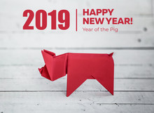 Chinese Zodiac Sign Year Of Pig, Red Paper Cut Pig, Happy New Year 2019 Year. White Wood Background