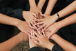 © Amphon - Closeup of young women's hands show sign of commitment.