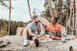 © Viacheslav Yakobchuk - Some tomato. Caring loving girlfriend giving some tomato for her handsome bearded boyfriend having tasty picnic