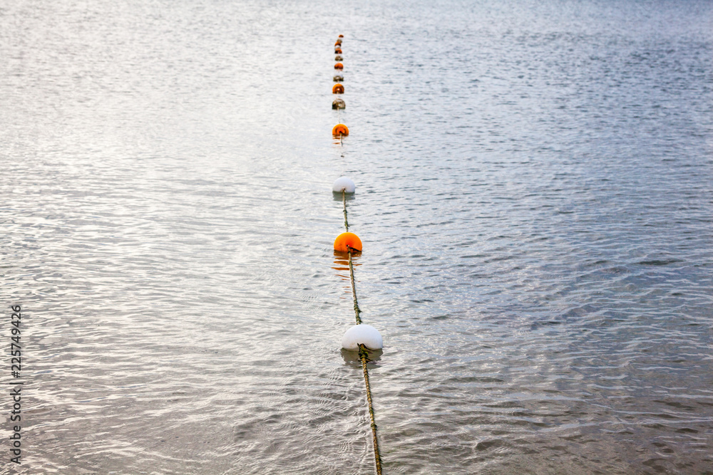 Safety rope and float line on the water Stock Photo | Adobe Stock