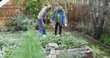 © Mark Adams - Senior black couple looking at garden