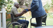 © Mark Adams - Disabled senior black man sitting in wheel chair