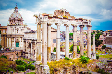 Wall Mural - Panorama of Roman Forum (Forum Romanum) -  Temple of Saturn on rectangular plaza surrounded by ruins of several important ancient government buildings at center of city of Rome, Italy.