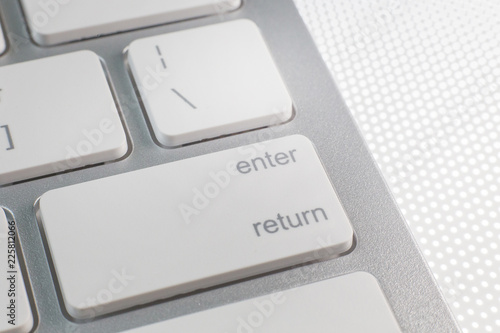 Fényképezés  The enter silver modern keyboard close up image.
