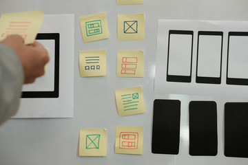 user experience UX designer designing web on smartphone layout. UI planning mobile application. developer work with business prototype