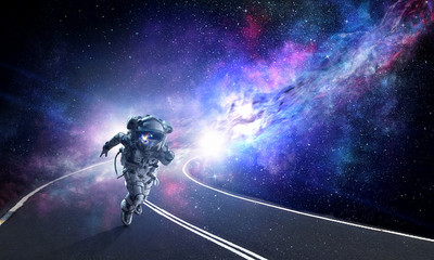 Wall Mural - Running spaceman and galaxy. Mixed media