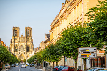 Wall Mural - Street view with cathedral in Reims city, France