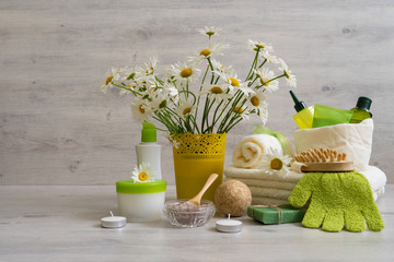 Spa composition with daisy flowers: cosmetic and bath products,