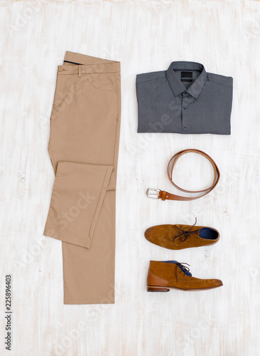 grey shirt tan pants