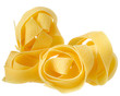 pasta pappardelle nest top view close up on a isolated