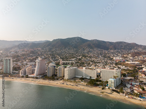 Fotografie, Obraz Aerial panoramic view of the Acapulco Bay in Mexico during the sunset