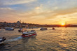 Bosphorus strait with ferry boats on the sunset in Istanbul