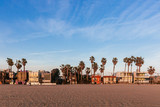 Fototapeta  - Houses and palm trees near Venice Beach, Los Angeles