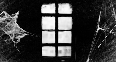 Wall Mural - Old gothic window. Spiderwebs isolated on black grunge background. Cobweb in the corner. Light and shadow. Halloween decoration