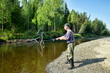© ArtEvent ET - The fisherman catches fish in the river