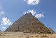 The Great Pyramid of Giza (also known as the Pyramid of Khufu or the Pyramid of Cheops) is the oldest and largest of the three pyramids in the Giza pyramid complex.