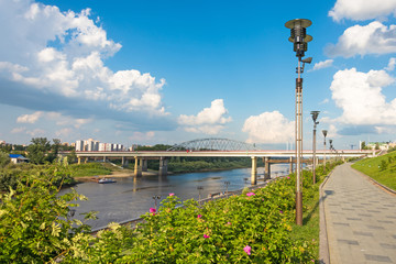 Wall Mural - Embankment of the river with stairs and street lights at the summer.