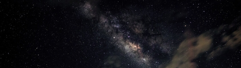 night sky milky way and star on dark background.universe filled with stars, nebula and galaxy with n