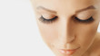 © Olesia - Beautiful girl with long false eyelashes and perfect skin. Eyelash extensions, cosmetology, beauty and skin care